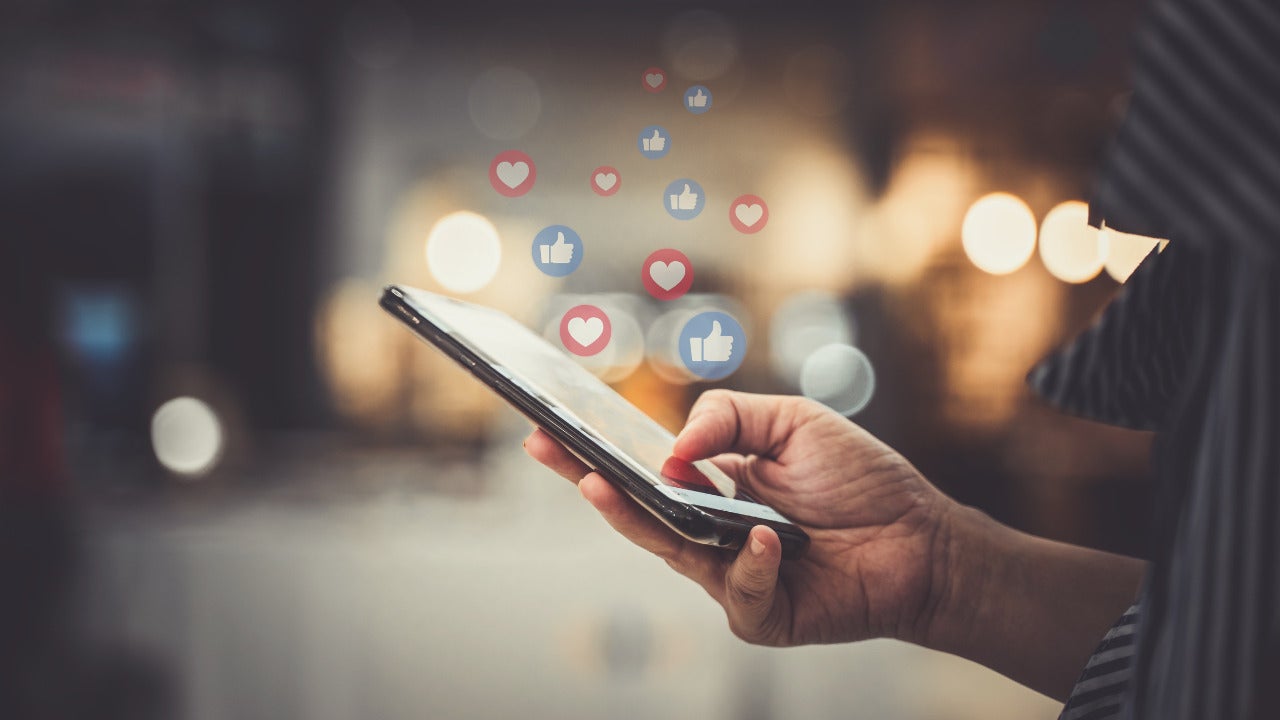 Someone interacting with a phone on social media