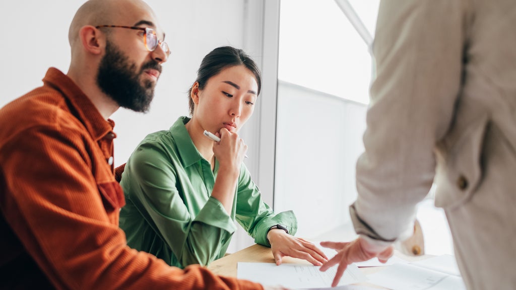 Couple buying or selling a home with broker