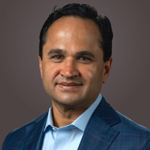 Corporate headshot of Waqas Cheema