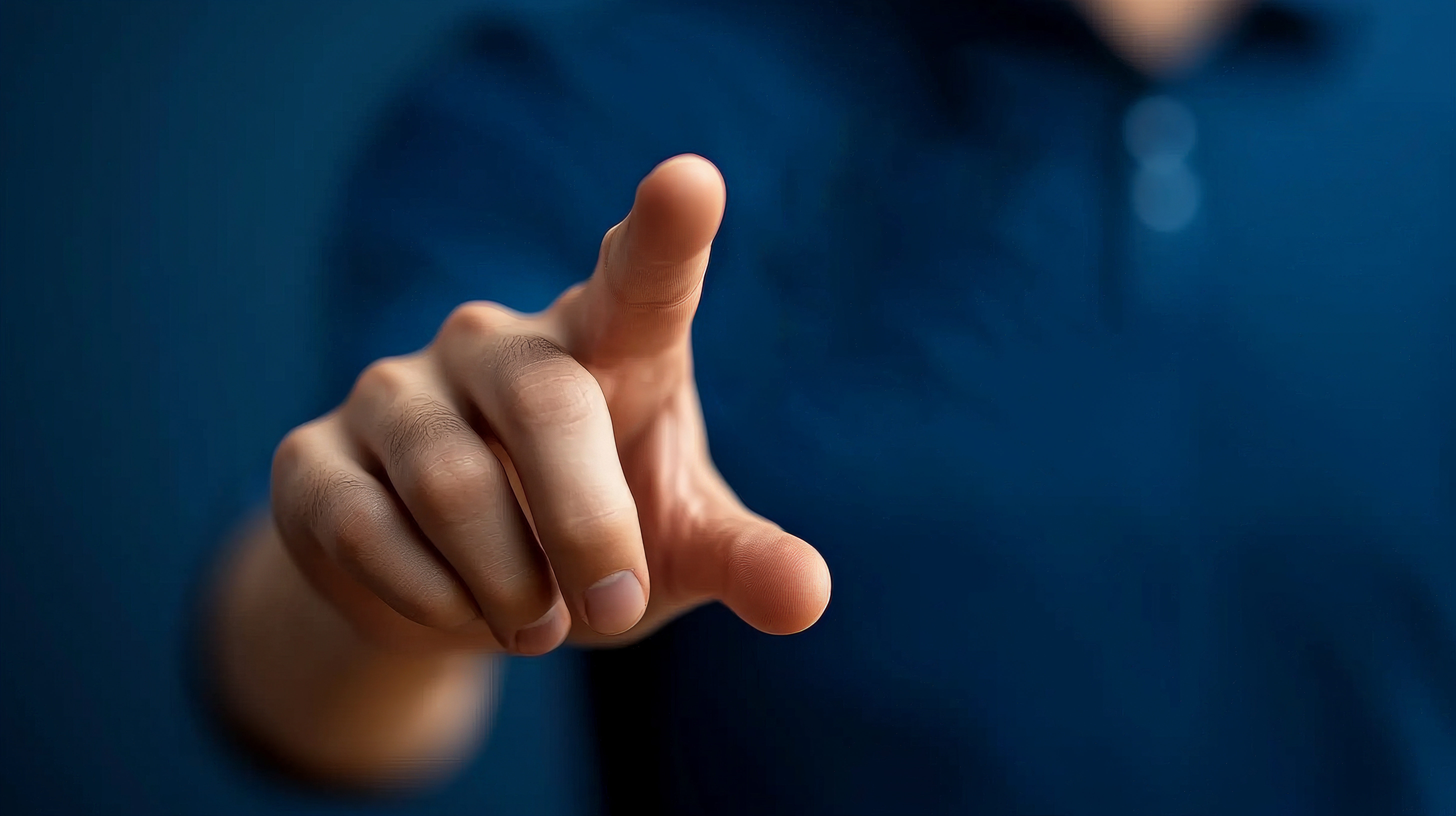 A person clicking a screen.