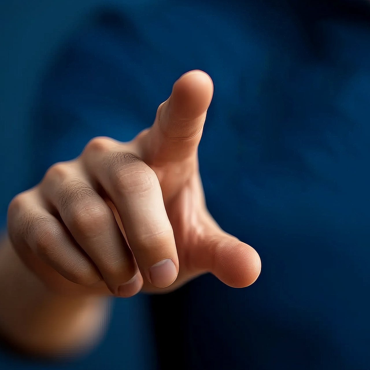 A person clicking a screen.