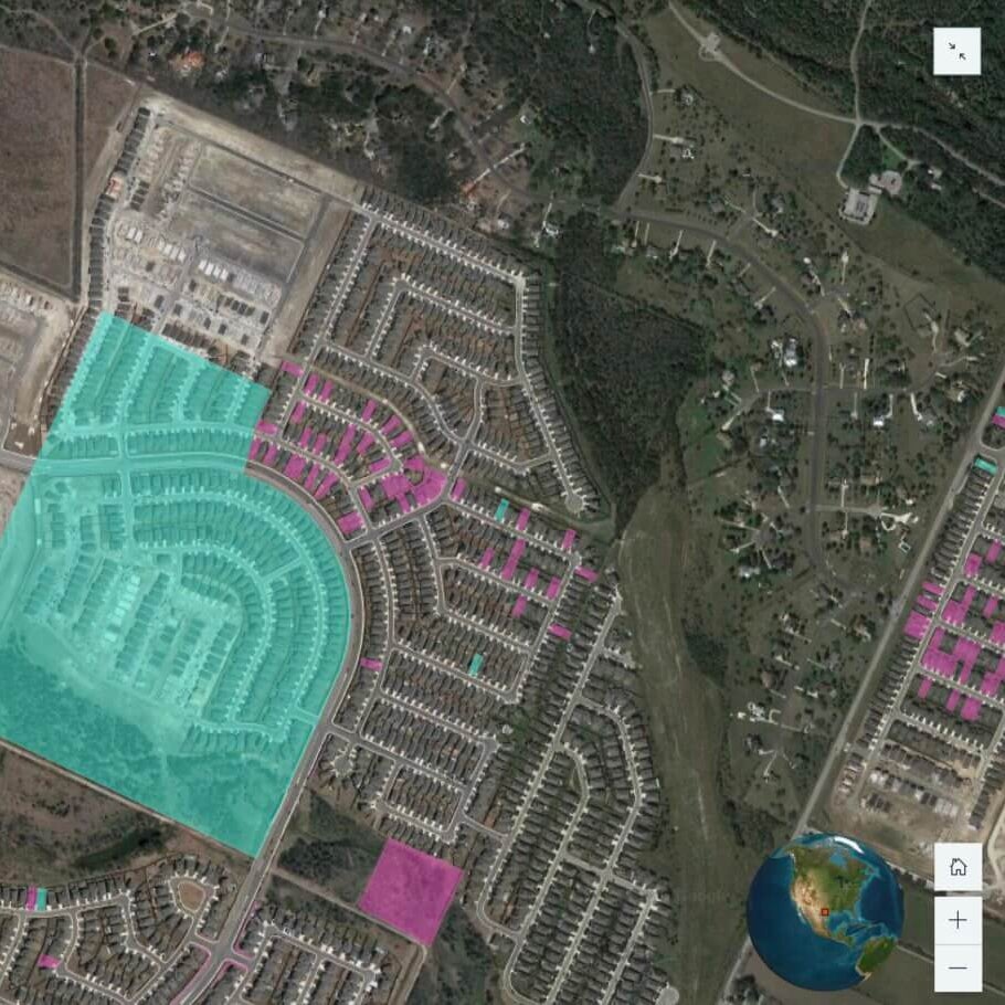 An aerial view of a residential development, likely in the planning or early construction phase.