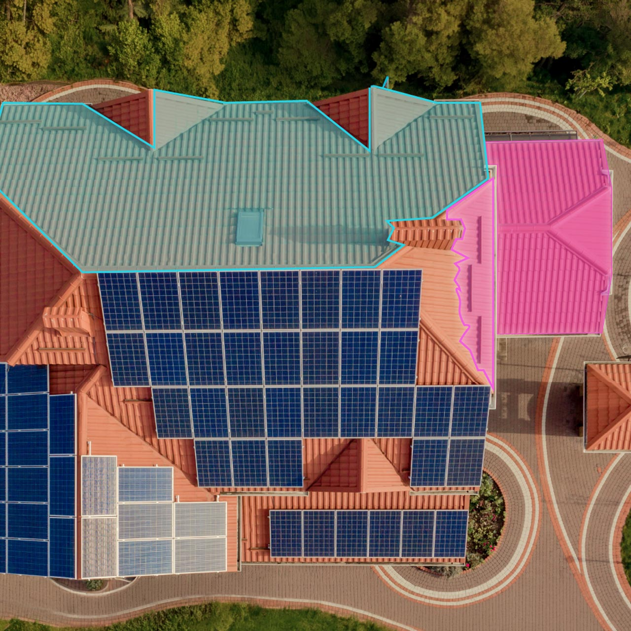 AI segmentation outlining separate roof sections in teal and pink on an aerial view of a solar-paneled home.