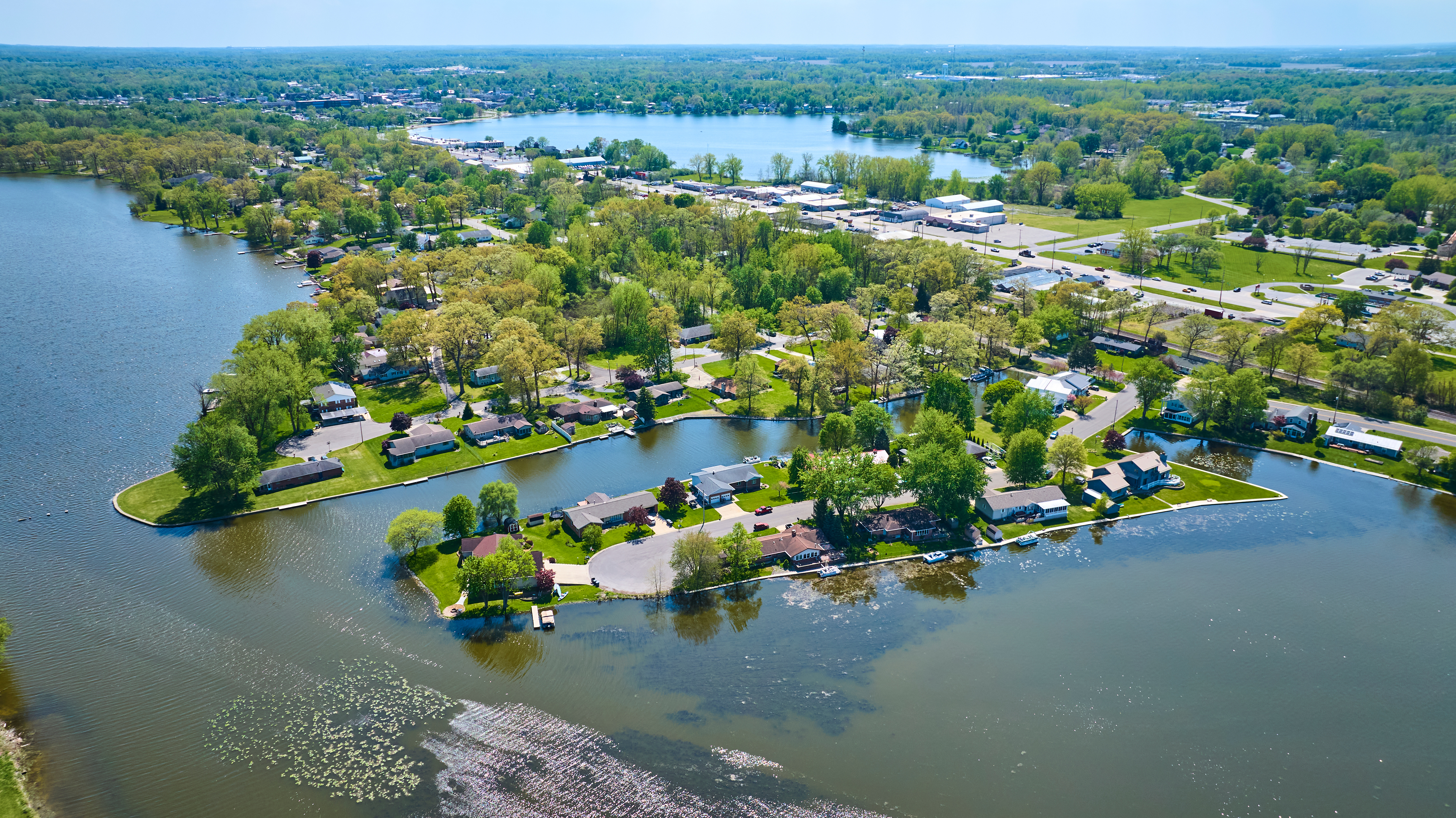 An aerial view of waterfront properties located on a canal system. 