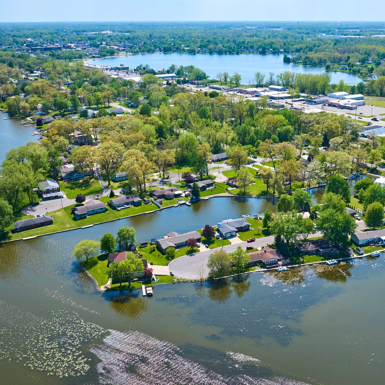 An aerial view of waterfront properties located on a canal system.