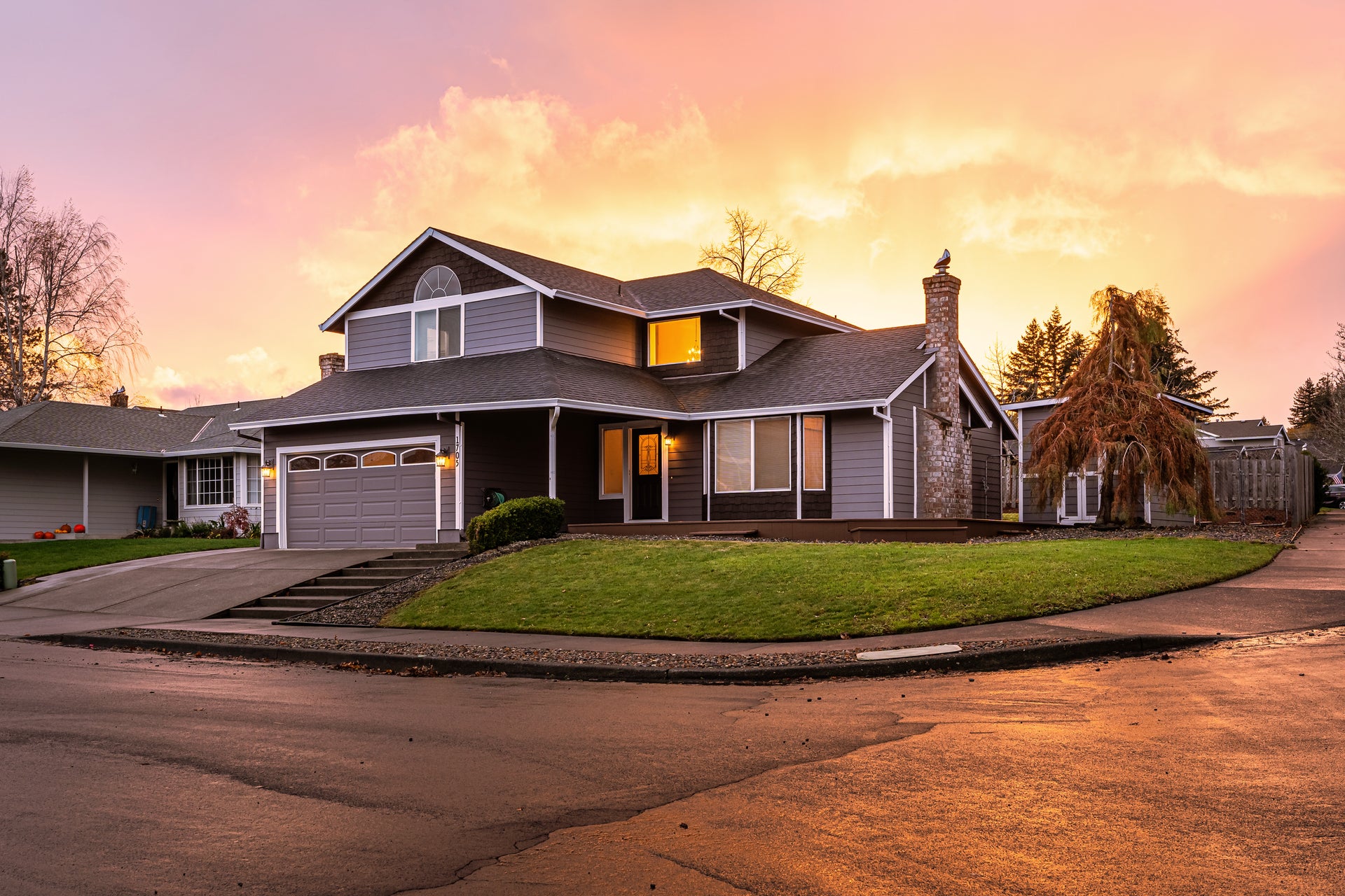 Single-family suburban home at sunset