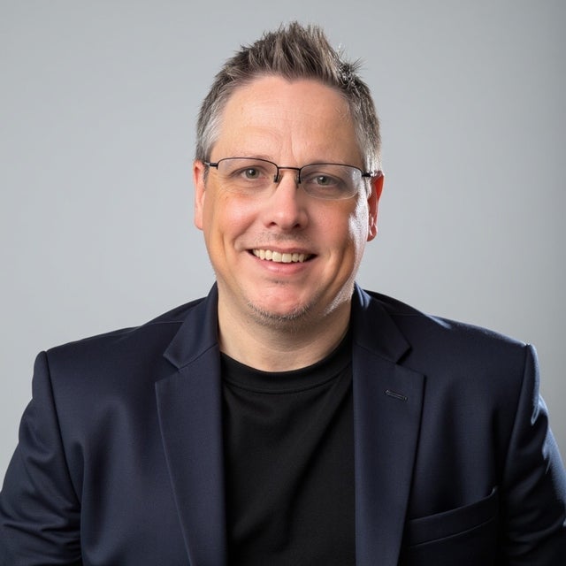 Headshot of Dustin Moore