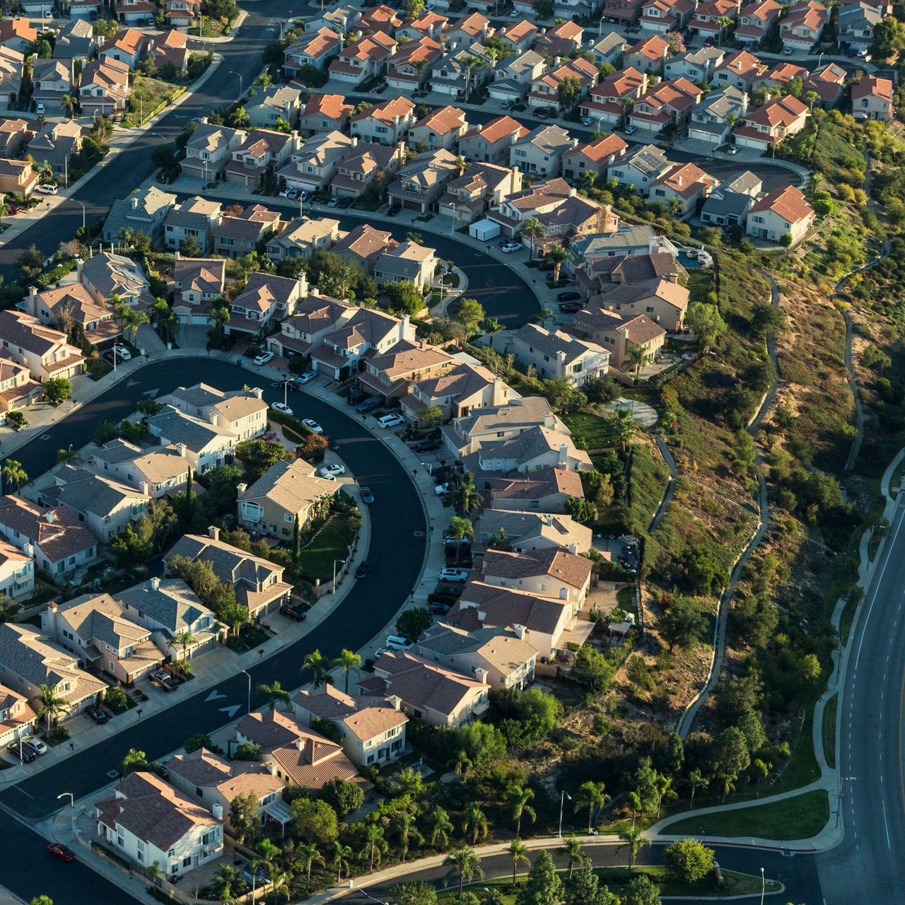 An aerial view of a suburban neighborhood with numerous houses.
