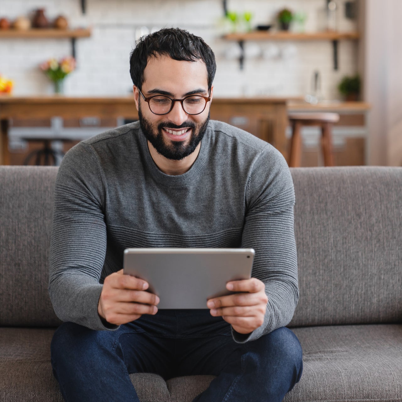 Claim participant interacting with a manager assessing damage real time through a tablet camera