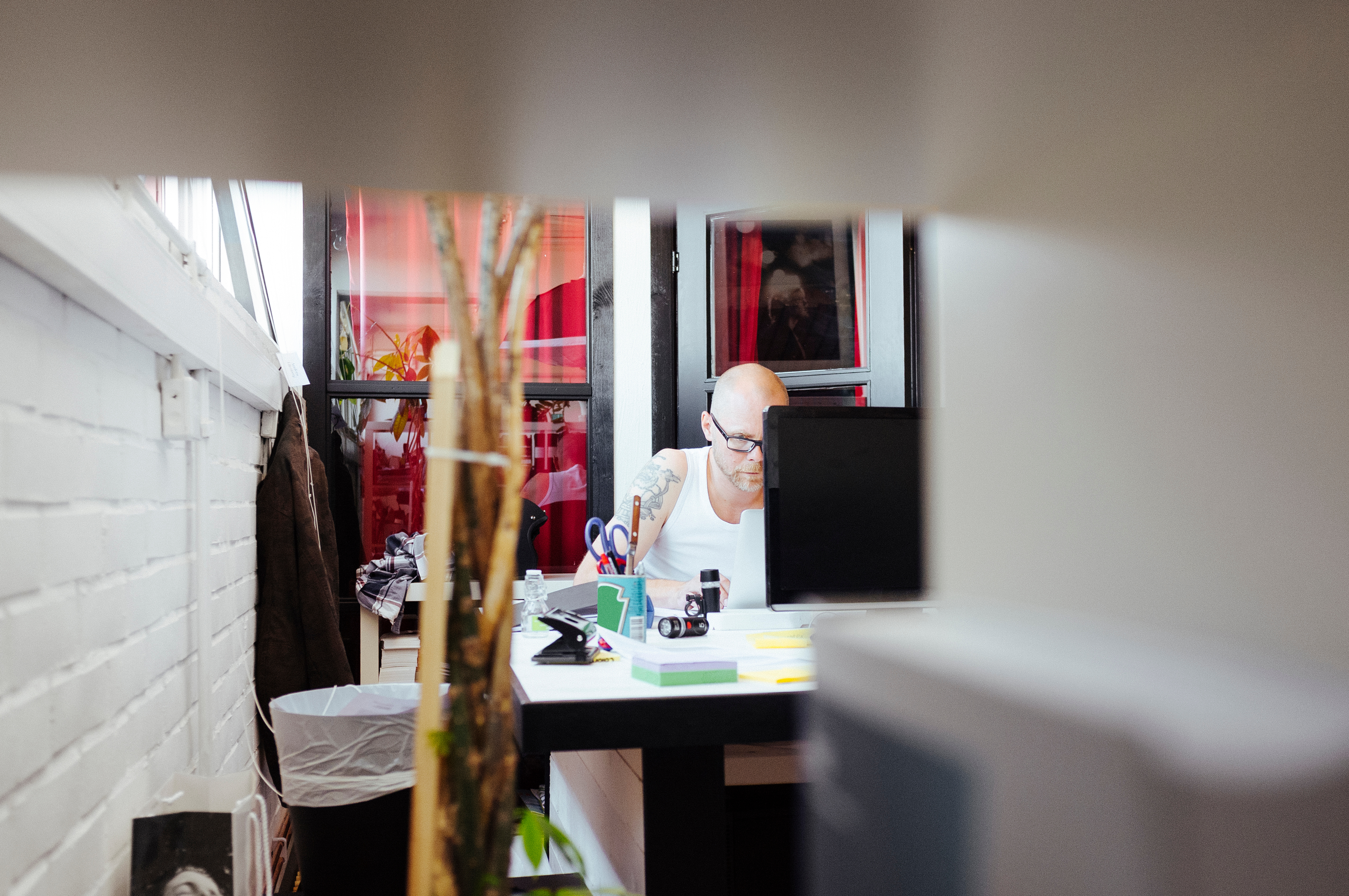 A man is working at a desk.