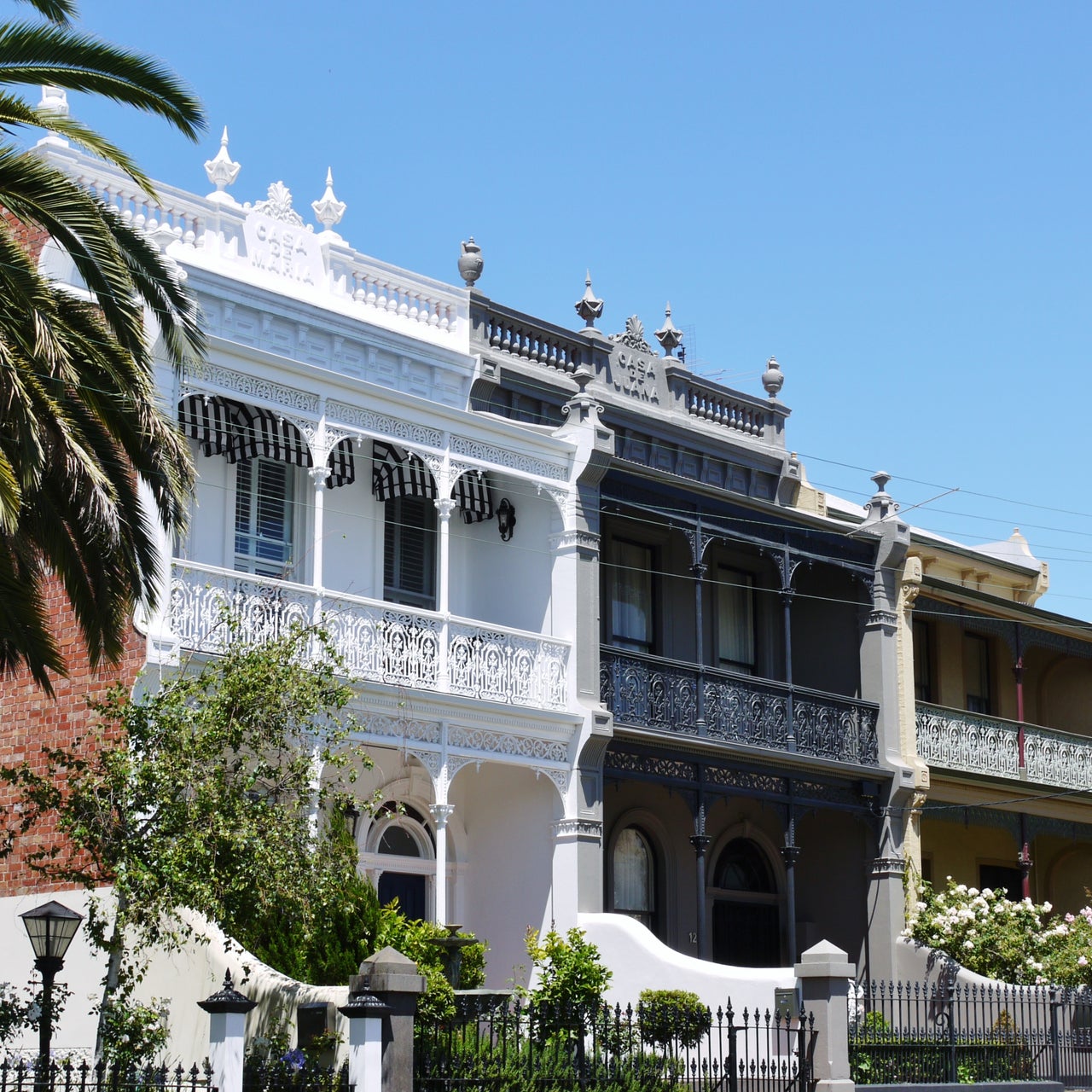 The image shows a close-up of a modern door handle and keyhole on an open door.