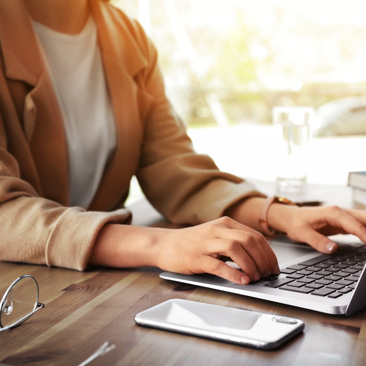 Woman working on computer at desk