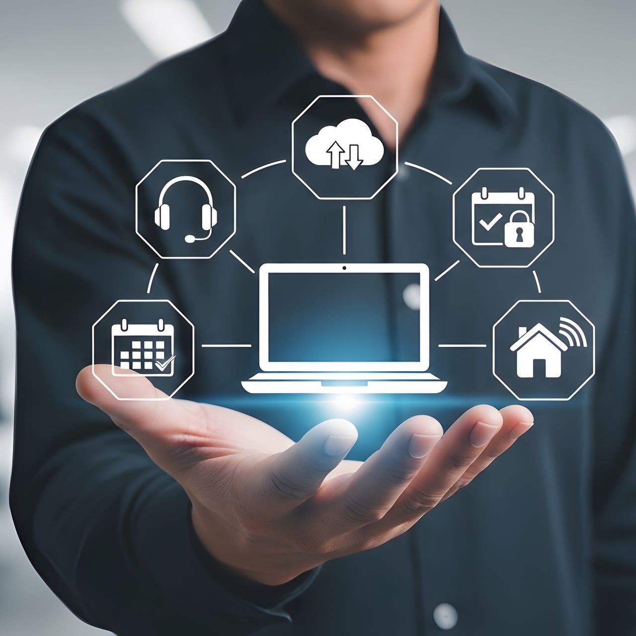 Man holding out hand with images of computer and interconnected AI components