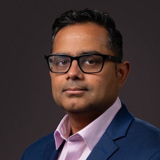 Corporate headshot of Devi Mateti