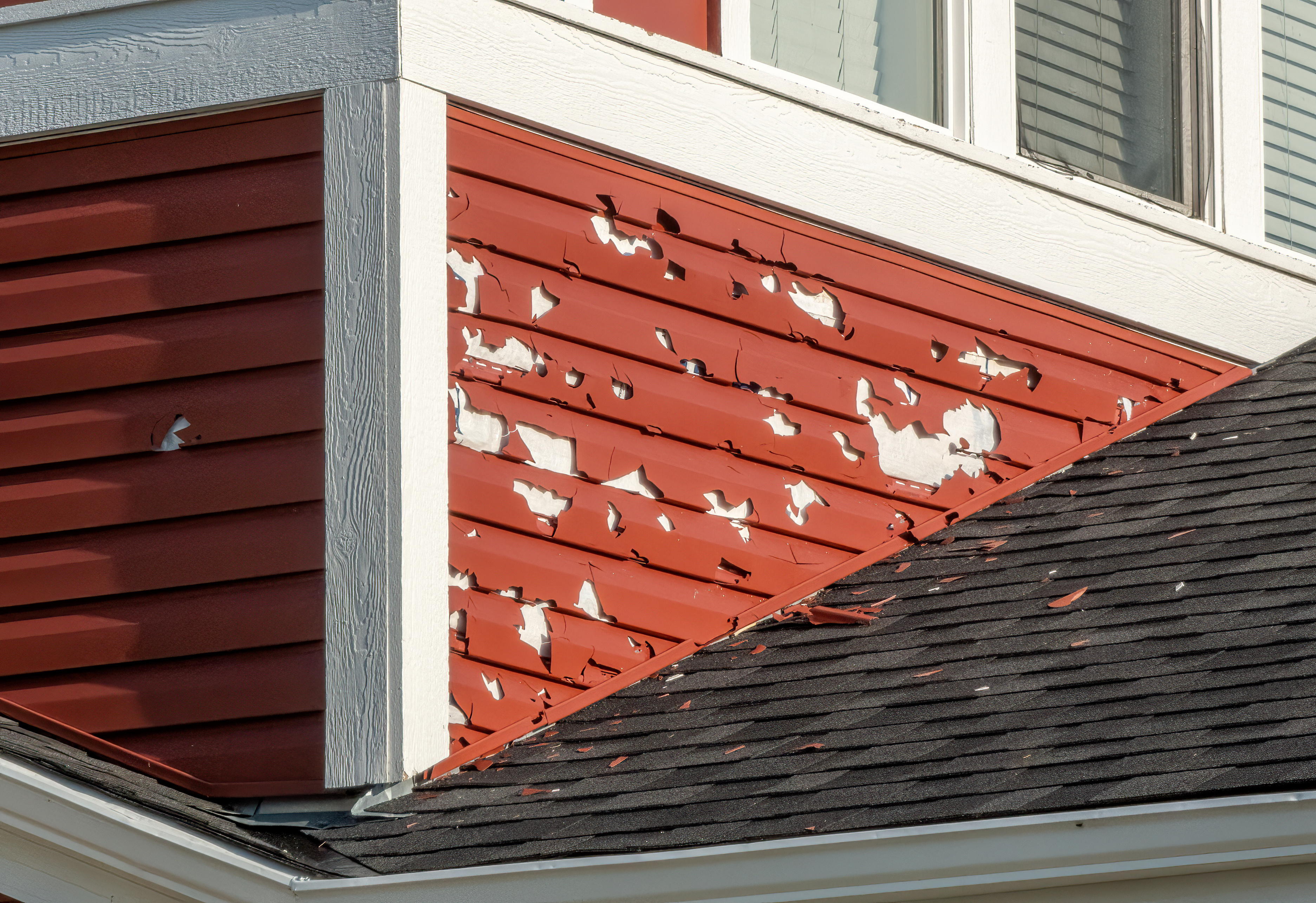 close up image of roof damage after a hail storm