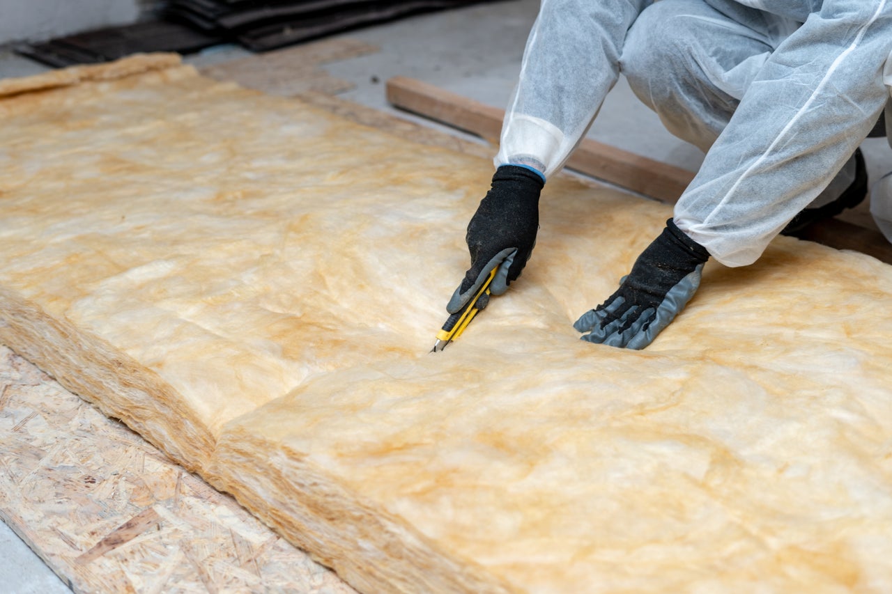 ceiling insulation being cut