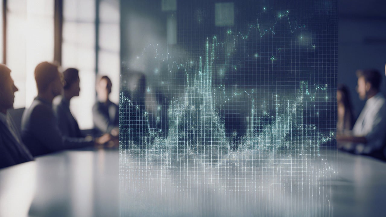 A team of people sitting in a conference room with an overlay illustration of data waves