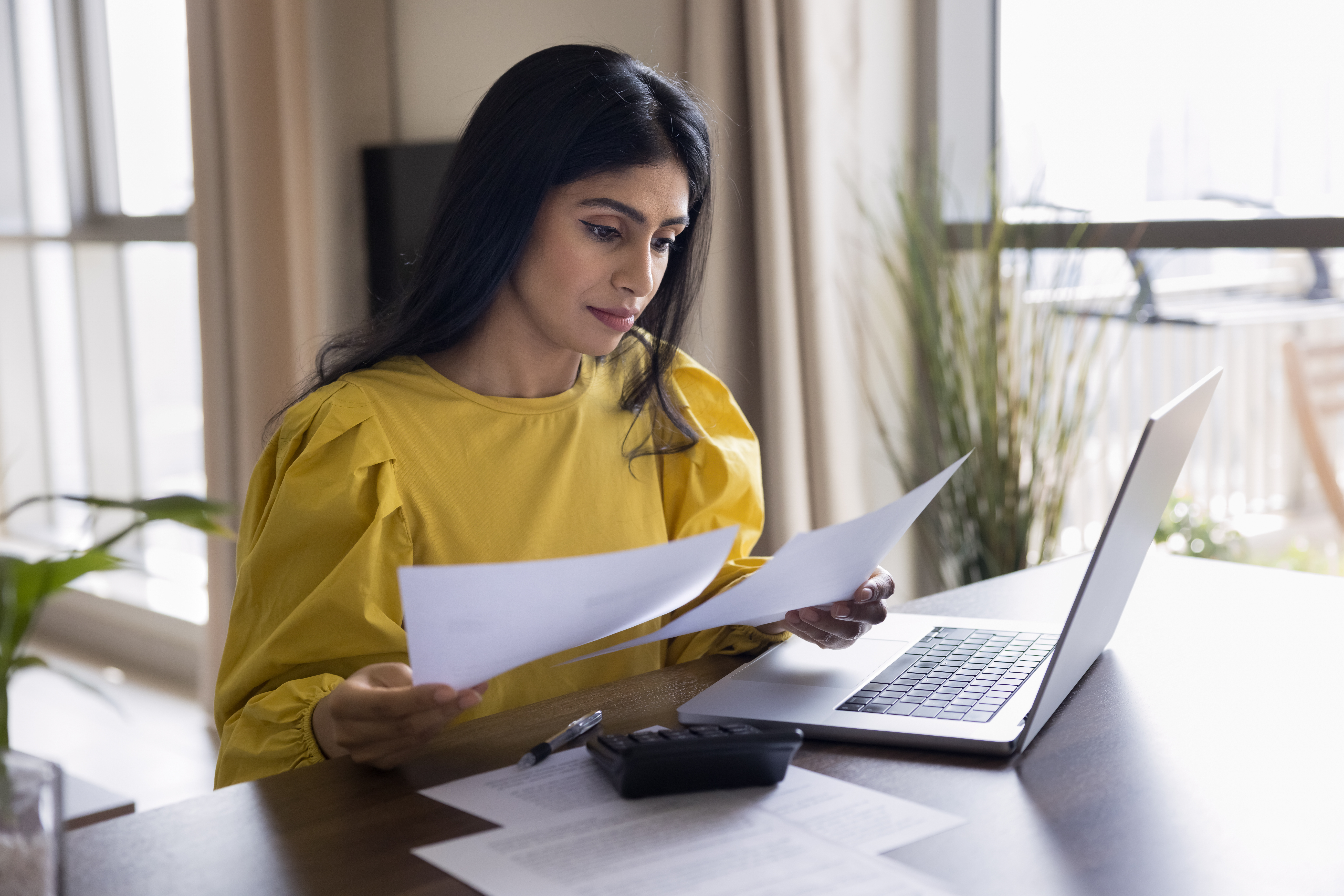 Woman on laptop working