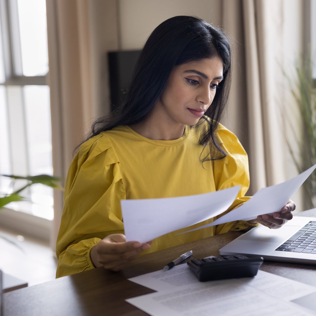 Woman on laptop working