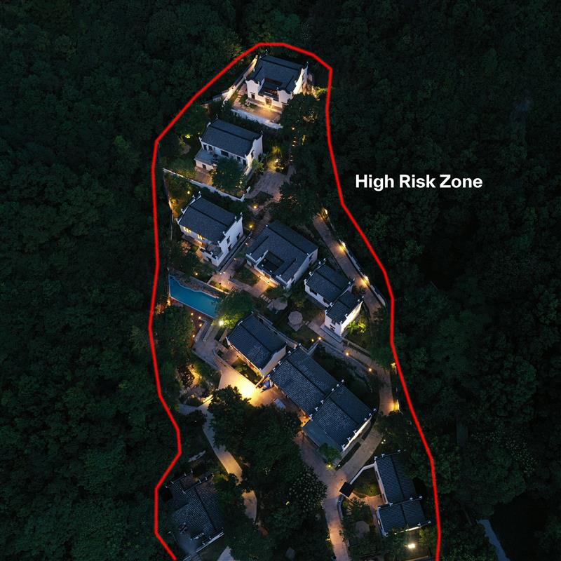 An image depicting a wildfire risk zone of houses