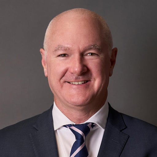 Corporate headshot of Tim Lawless
