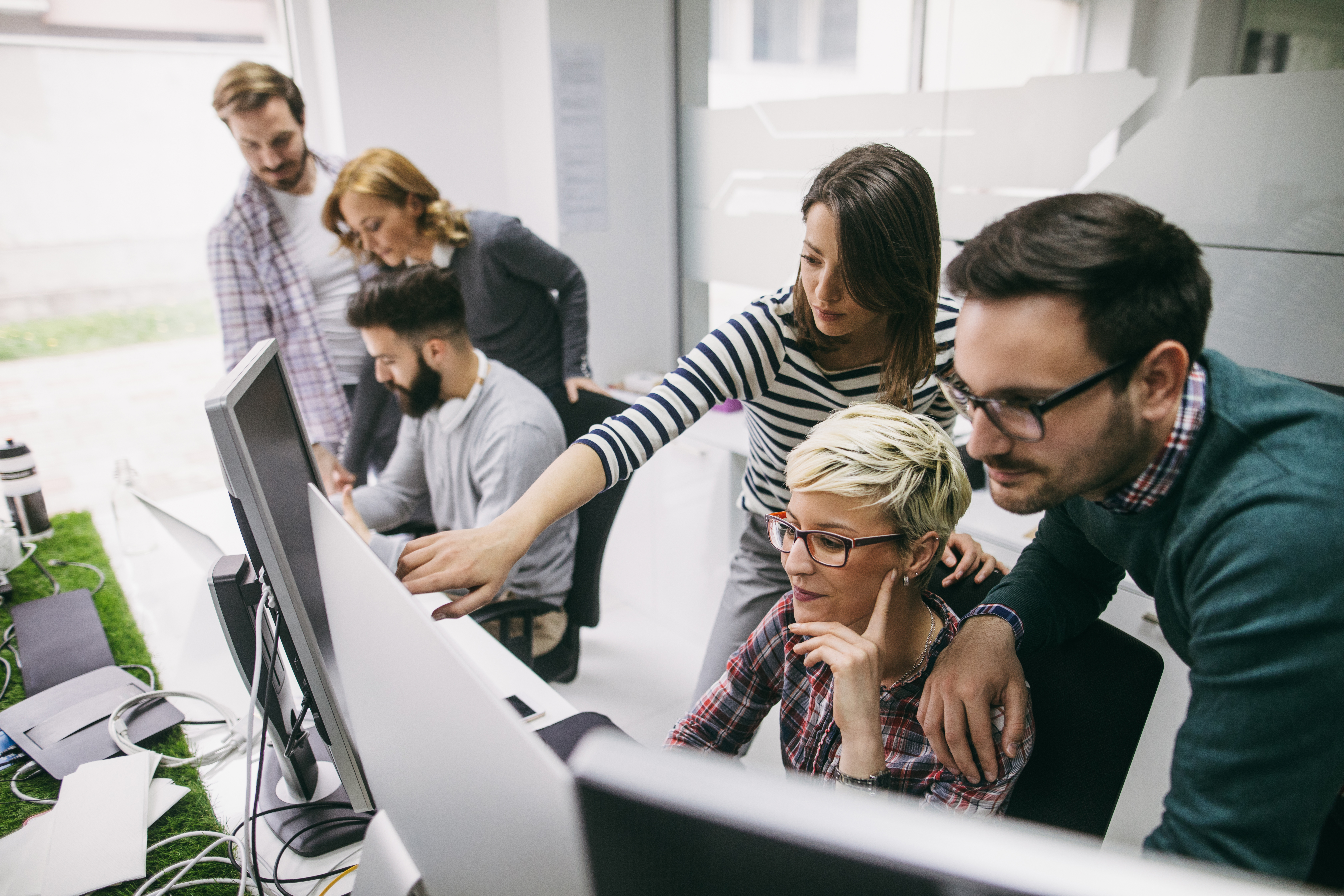 A team working on claims processes.