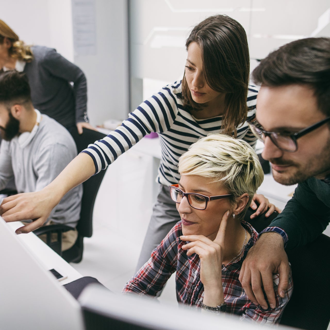 A team working on claims processes.