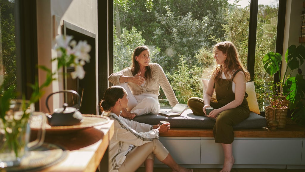 Three Gen Z women chatting
