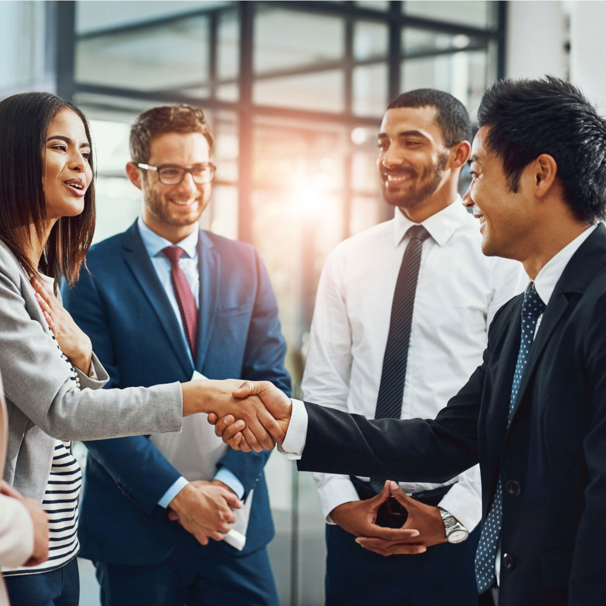 Four people meeting with introductions