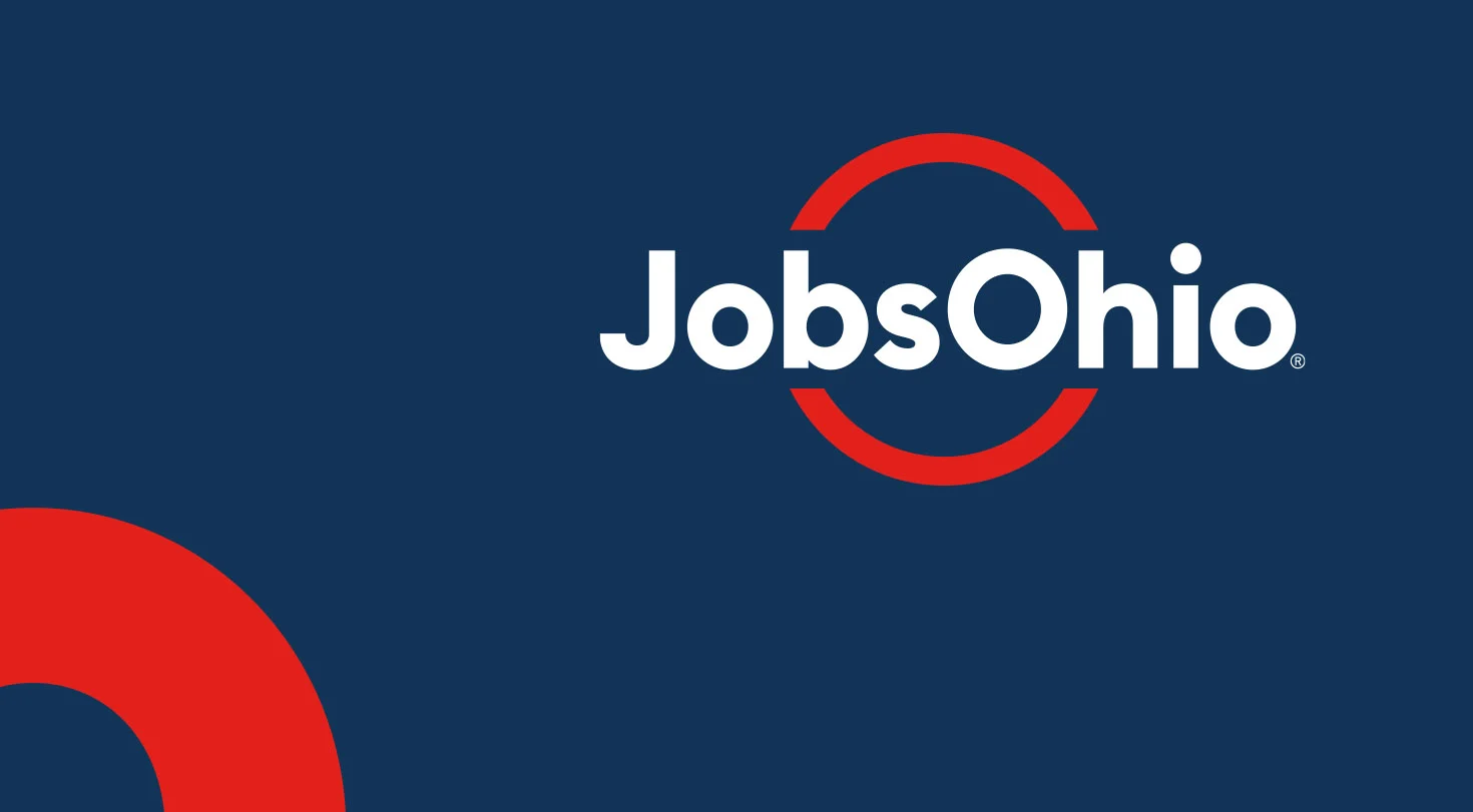 JobsOhio logo on a blue background with a red arch