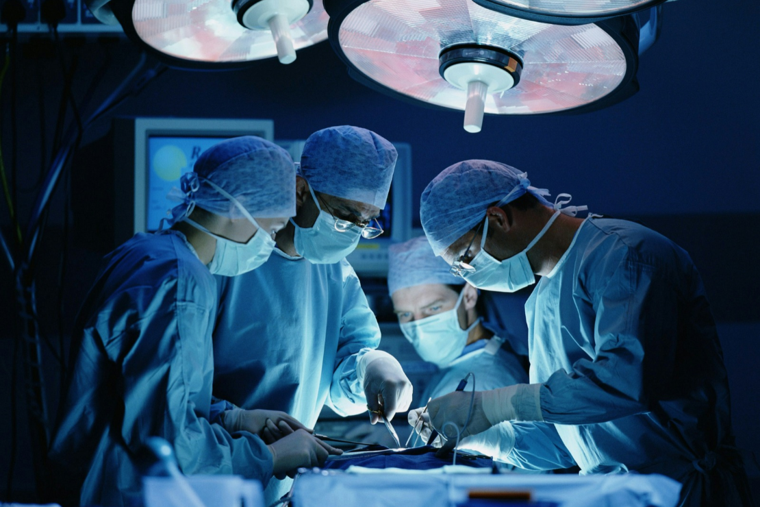 Healthcare workers in operating room