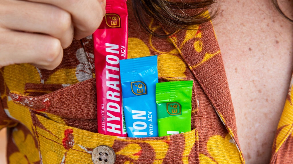 festival goer ready with three flavors of Essential elements Hydration