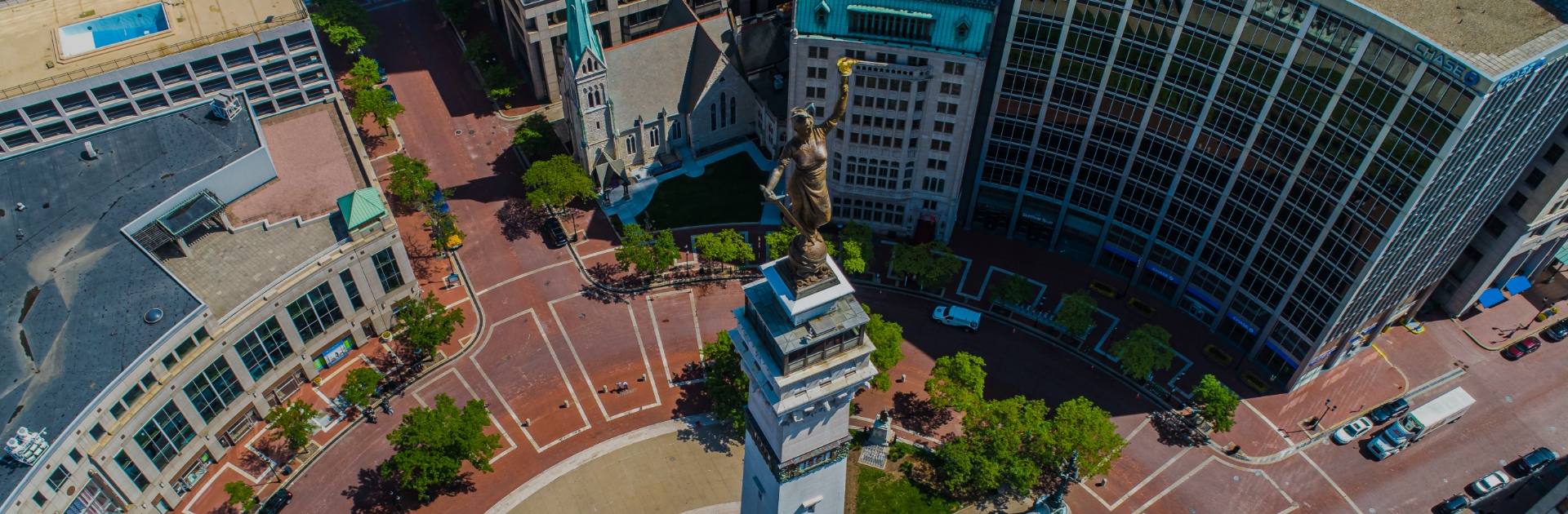 Aerial view of Monument Circle in downtown Indianapolis, location of PDA Miniverse 2025 where SHL Medical will share insights on LVSC autoinjector development.