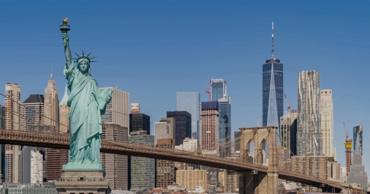 [.jpg] New York City skyline with the Statue of Liberty, representing SHL Medical’s participation in DCAT Week 2026 to discuss combination product development and manufacturing collaboration.