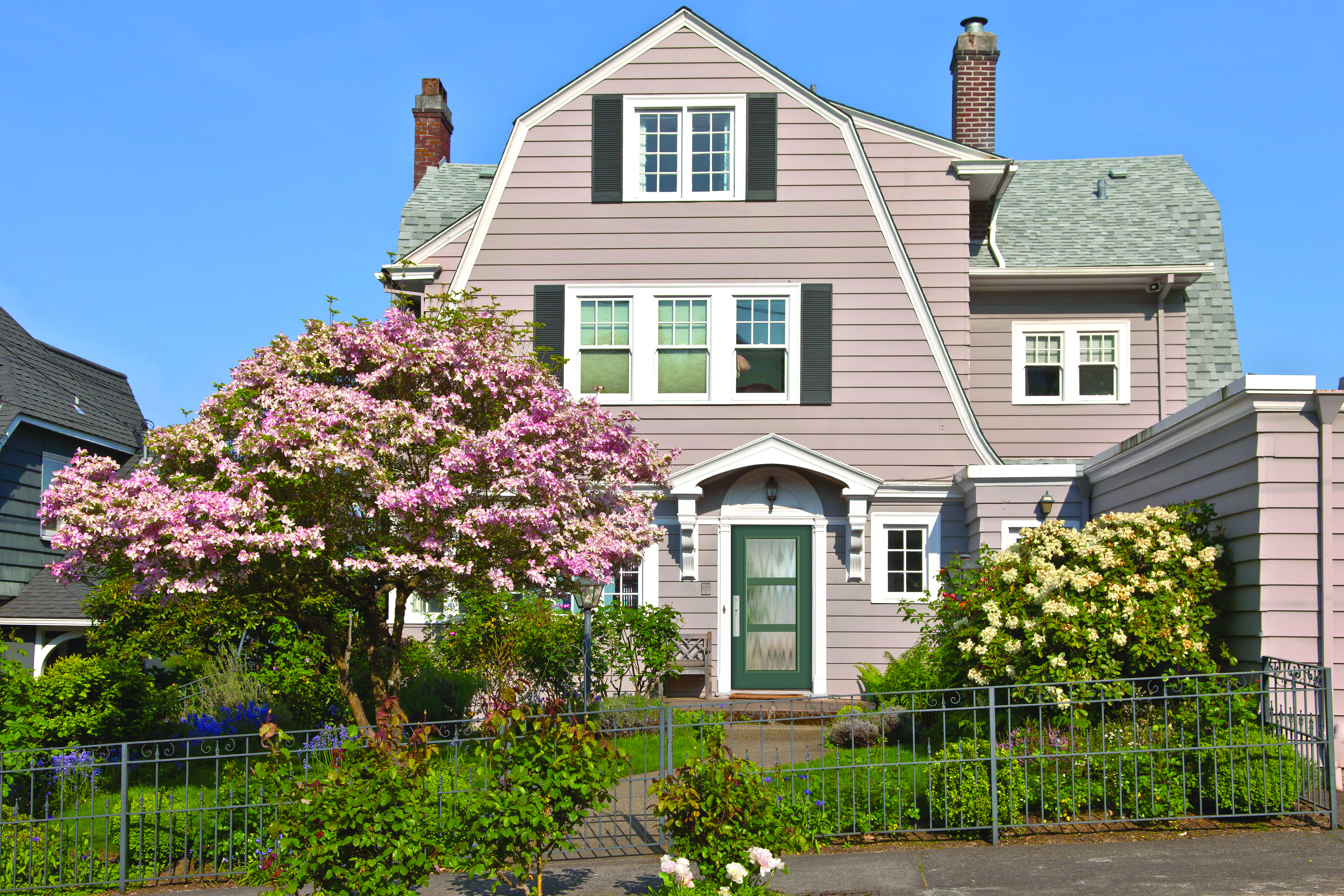 Modern door with simulated divided lites and chinchilla glass with a satin nickel handleset, prefinished in Courtyard.