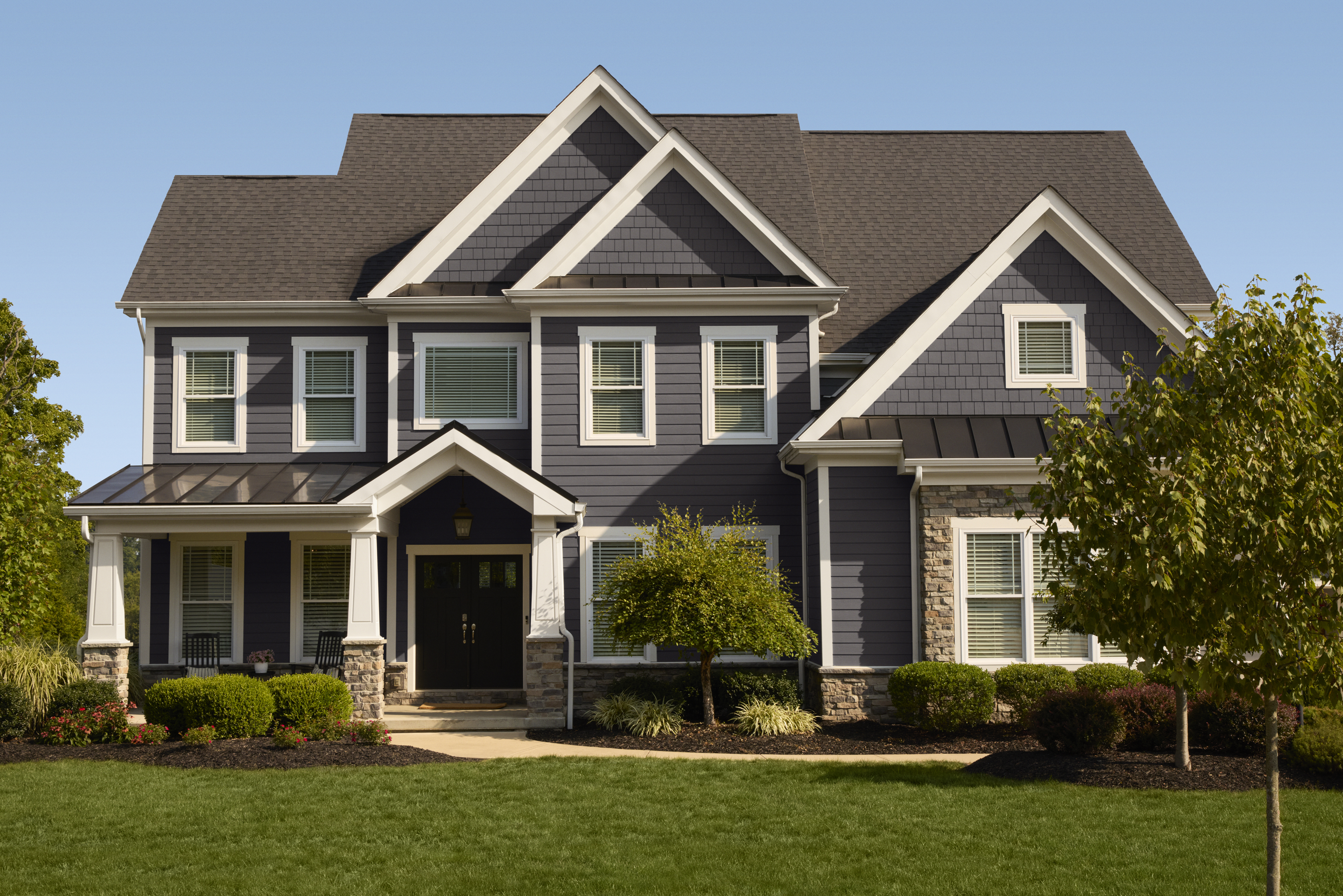 2-story home with hardie plank, shingle and trim in Artic White and Night Gray