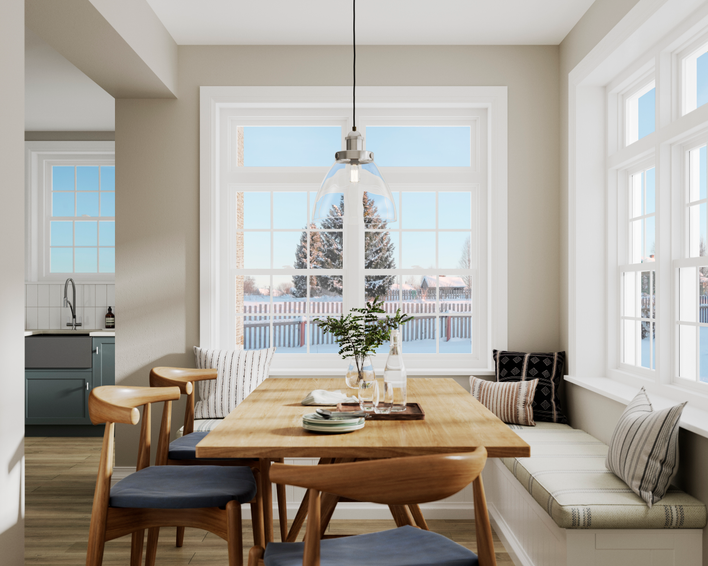 Energy-efficient vinyl window material keeps a breakfast nook cozy while looking out on a wintry landscape.