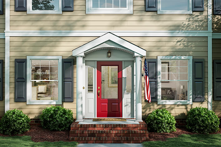 Classic home exterior with a red door