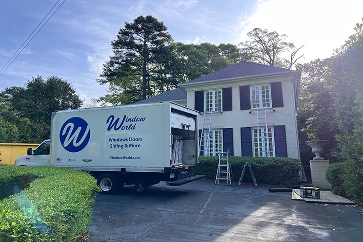 Window World Truck in front of house