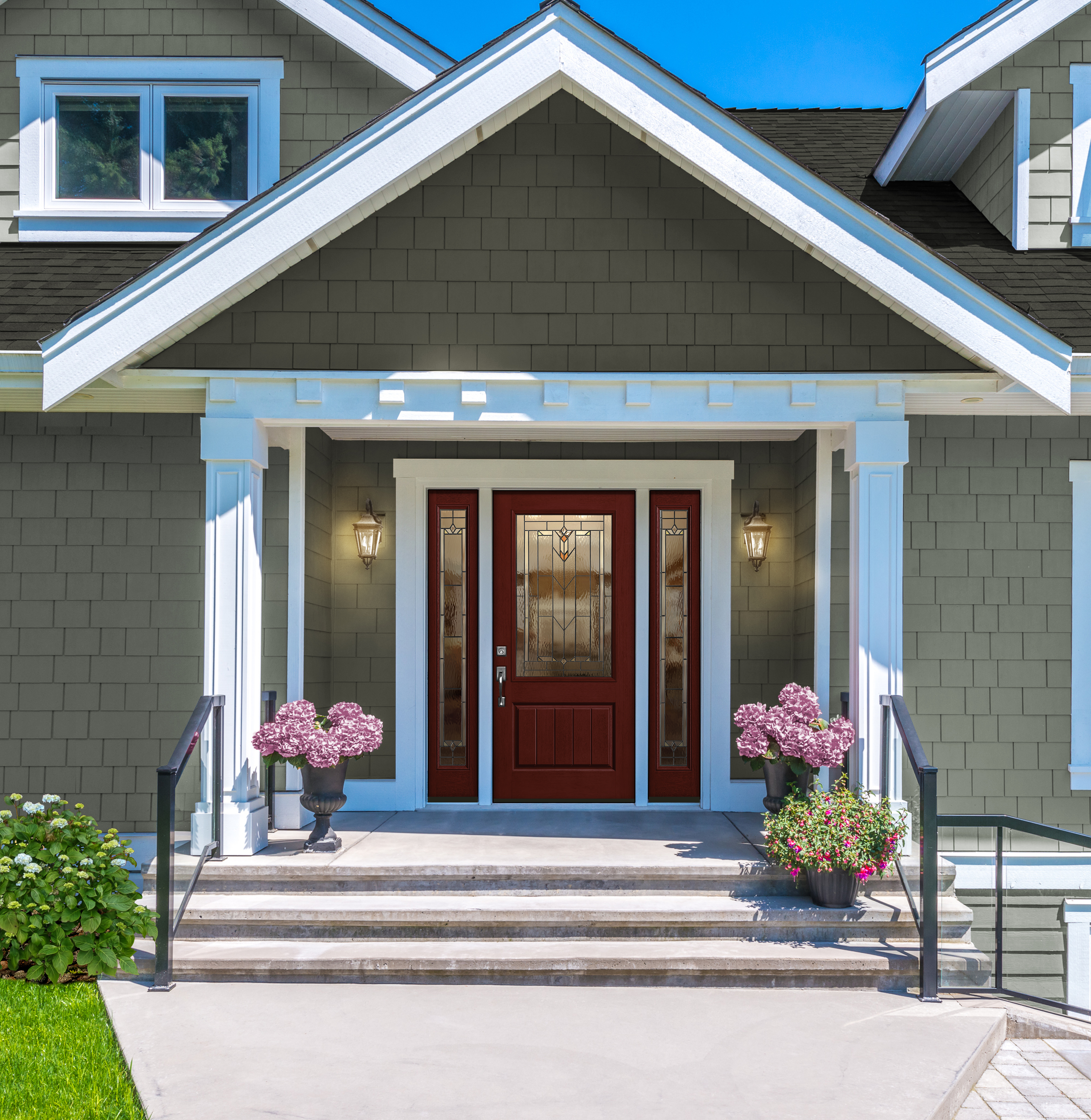 A Mulberry colored Classic Craft Entry Door with 2 full lite sidelites under a small porch