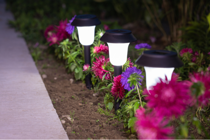 Solar-powered walkway lights and flowers
