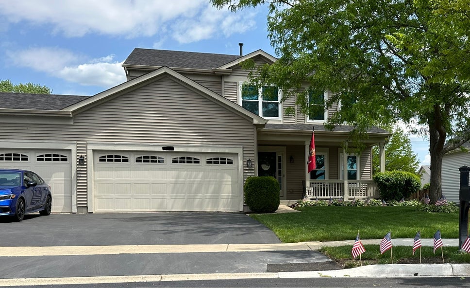 Exterior photo of Ramon's home after the new windows were installed by Window World