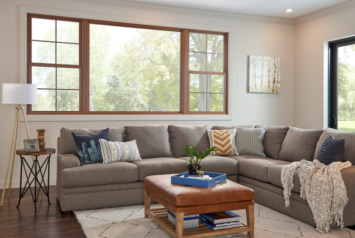 Modern window design includes combining picture and double-hung windows, as shown in this living room.