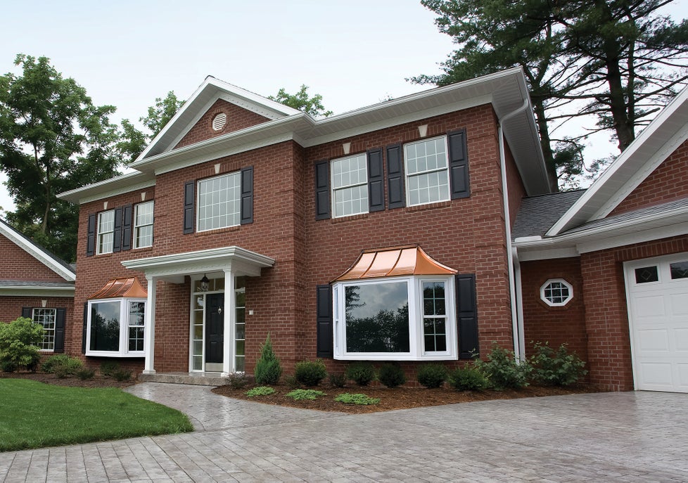 Colonial style home with red brick