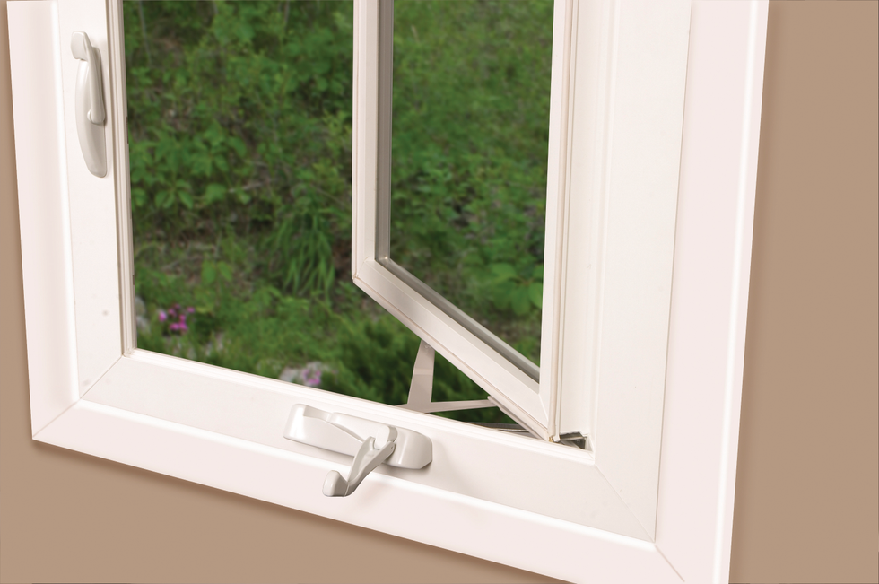 The window crank, latch, and window casement of a standard size window