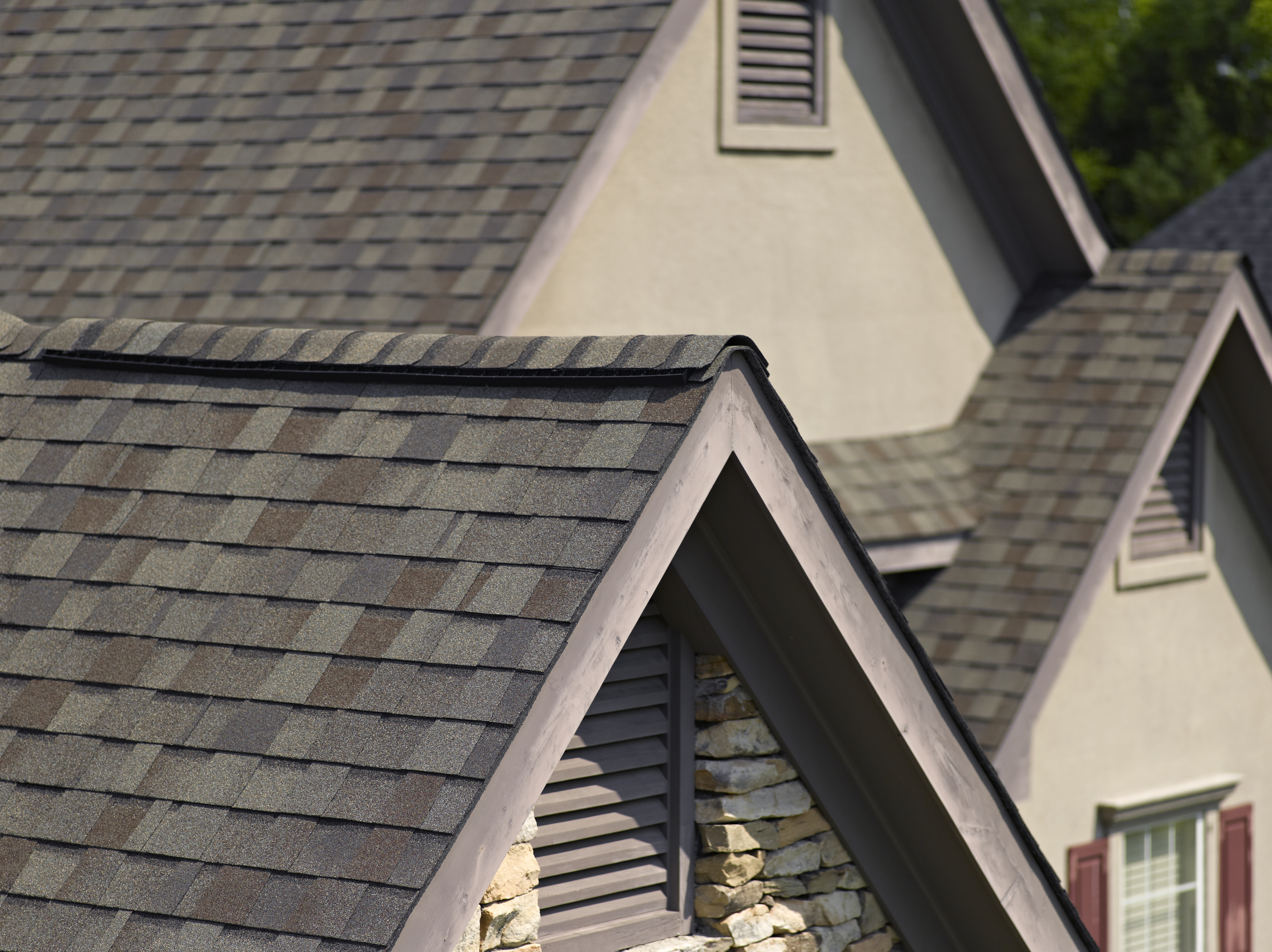 Close-up of a roof with CertainTeed's Landmark shingle line in the color Weathered Wood.