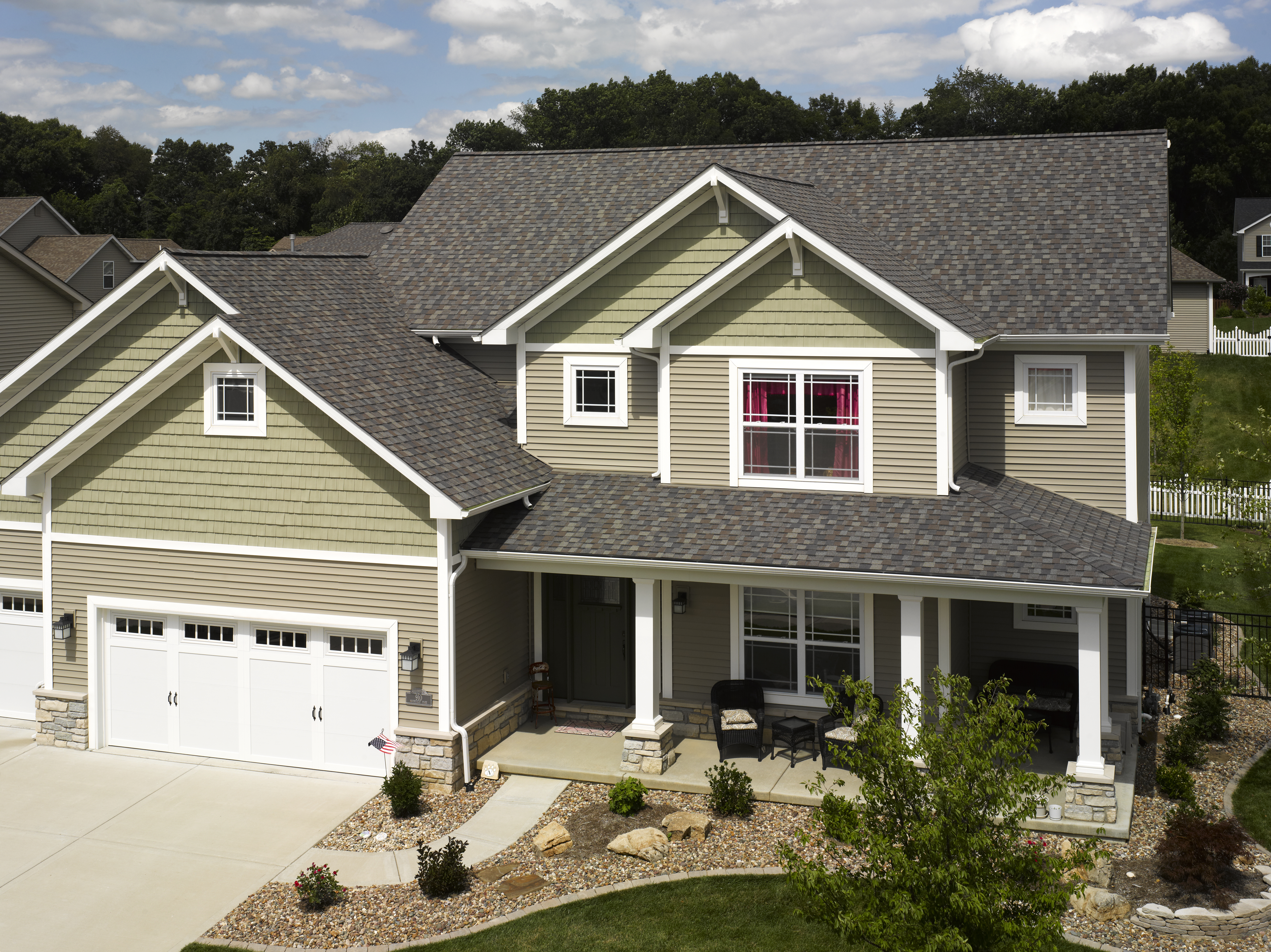 2 story home with shake and lap siding with CertainTeed's Landmark Pro shingle line in the color Driftwood.