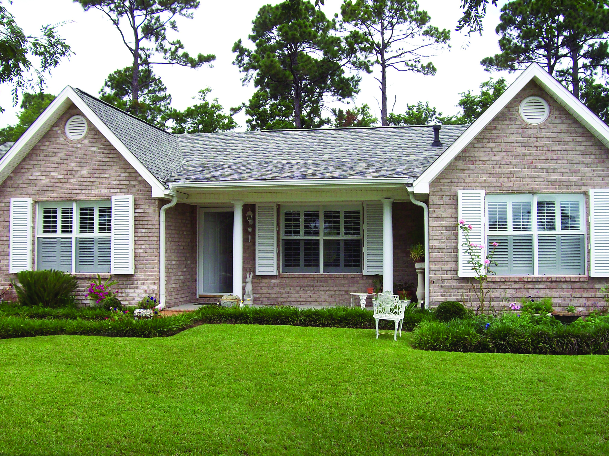White shutter color for a brick house.
