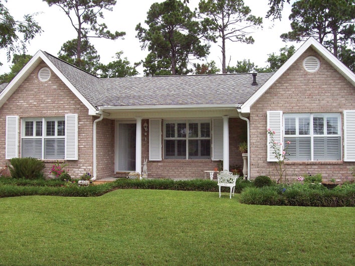 White shutter color for a brick house.
