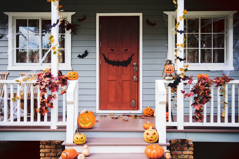 A front porch that has been decorated for Halloween